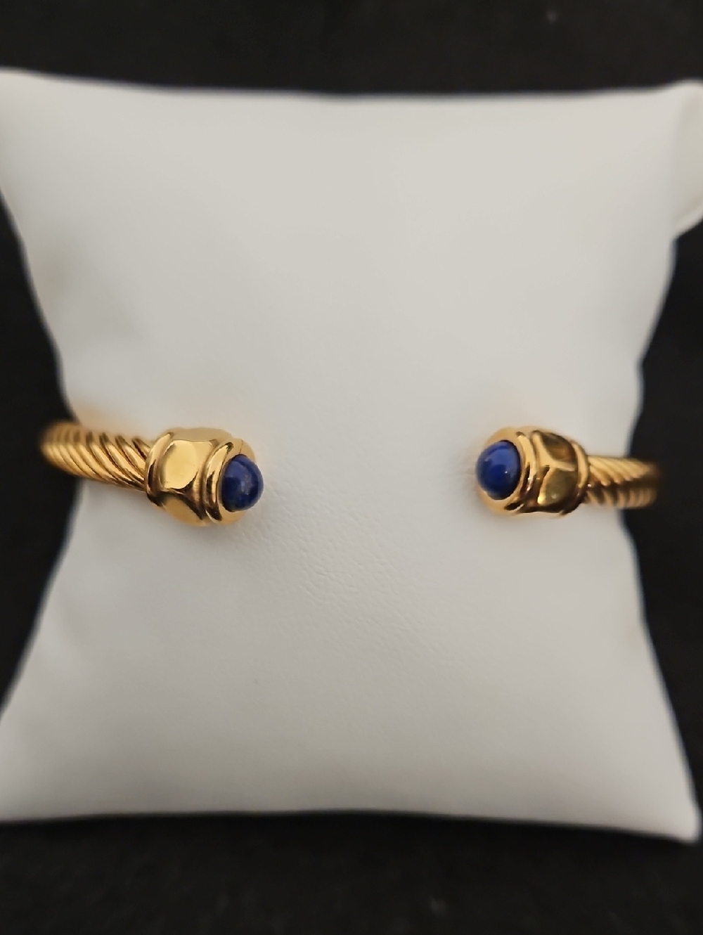 Gold Tone Cuff Bracelet with Blue Stone Terminals